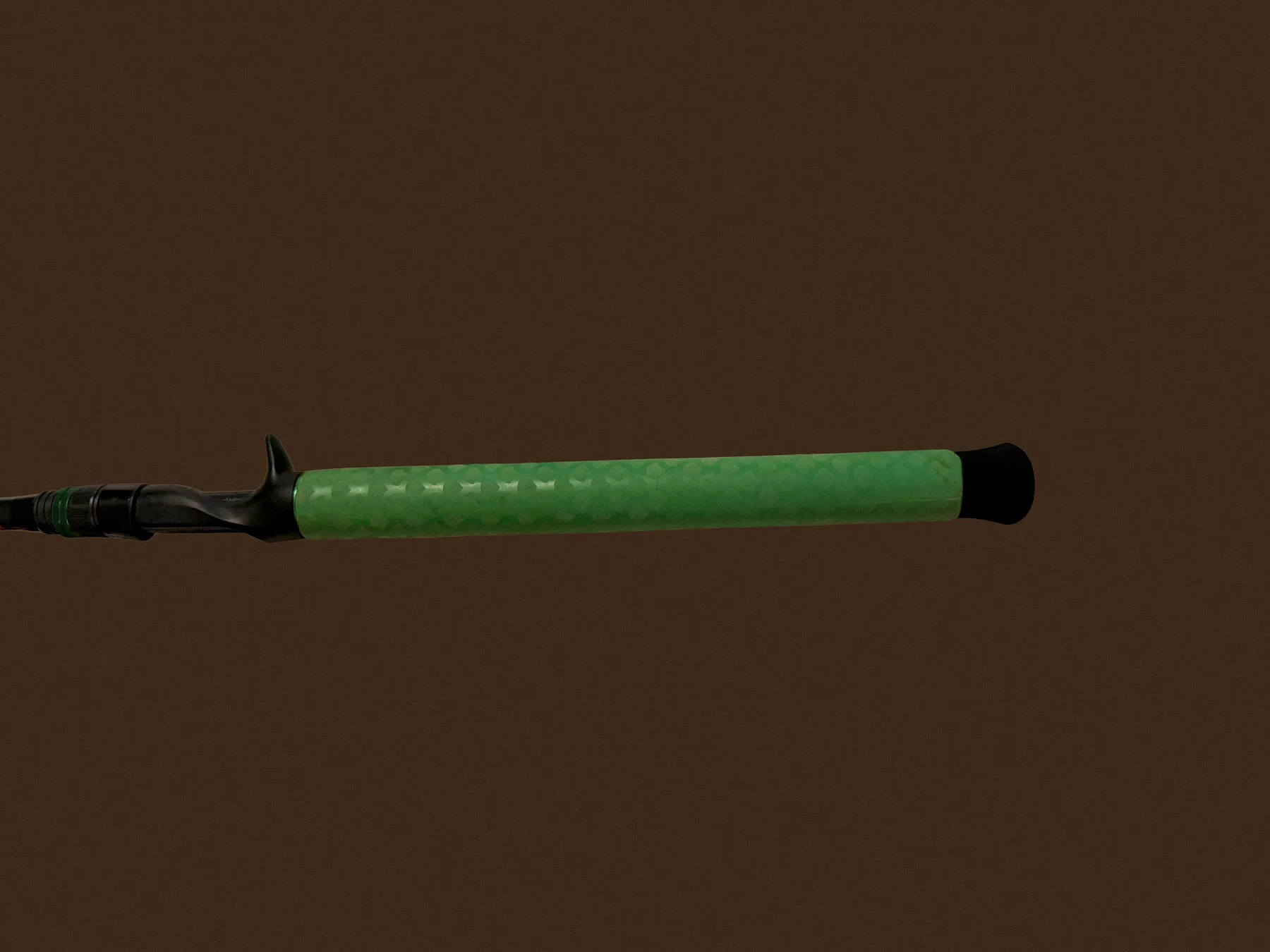 Green foam grip and butt cap detail on a Donkey Styx build