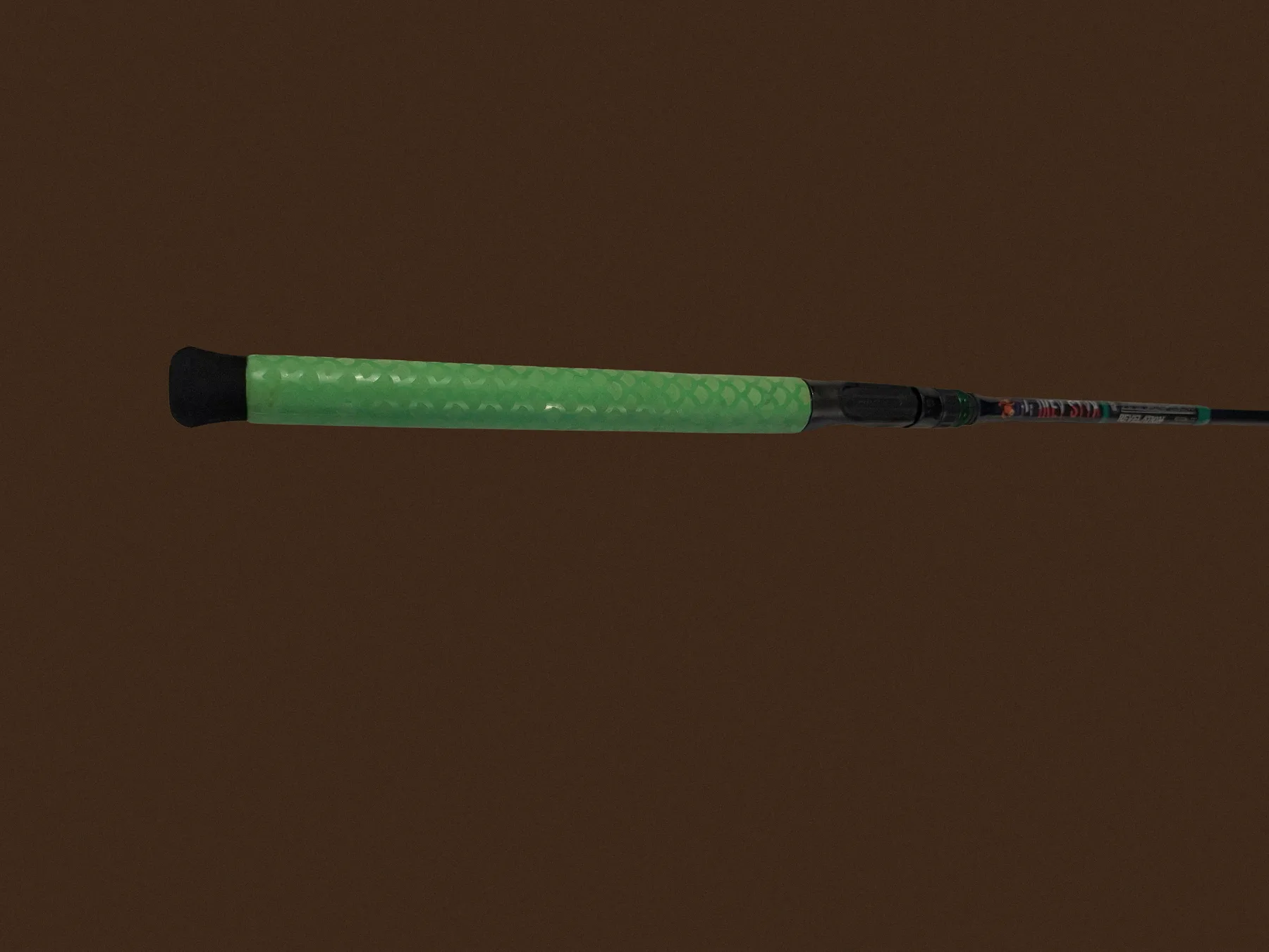 Green fish-scale foam grip and reel seat on a Donkey Styx build